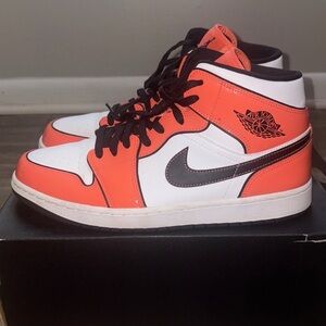 Air Jordan 1’s Mid Sneakers in Orange and White